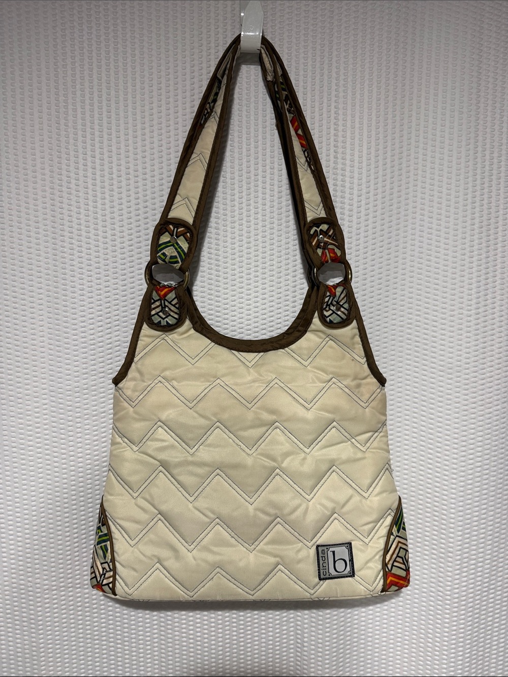 Cream Quilted Shoulder Bag with Brown Trim by b